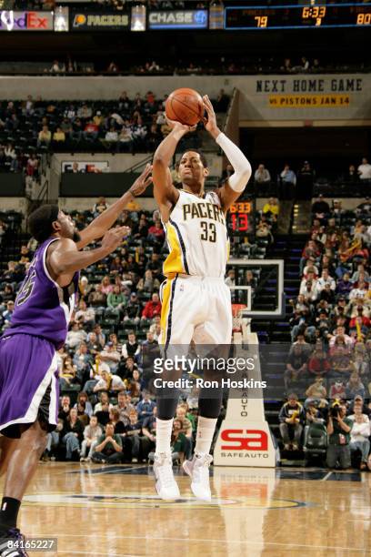 Danny Granger of the Indiana Pacers shoots over John Salmons of the Sacramento Kings at Conseco Fieldhouse on January 3, 2009 in Indianapolis,...