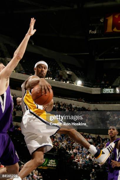 Ford of the Indiana Pacers passes behind his back against the Sacramento Kings at Conseco Fieldhouse on January 3, 2009 in Indianapolis, Indiana....