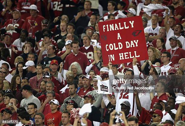 Fans of the Arizona Cardinals hold up a sign during the NFC Wild Card Game against the Atlanta Falcons on January 3, 2009 at University of Phoenix...