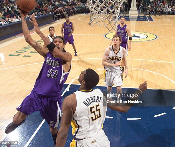 Mikki Moore of the Sacramento Kings shoots over Roy Hibbert of the Indiana Pacers at Conseco Fieldhouse on January 3, 2009 in Indianapolis, Indiana....