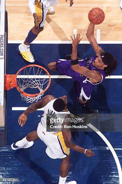 Mikki Moore of the Sacramento Kings shoots over Roy Hibbert of the Indiana Pacers at Conseco Fieldhouse on January 3, 2009 in Indianapolis, Indiana....