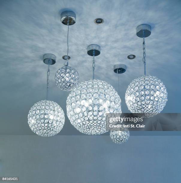 various crystal globe chandelier lighting fixtures - crystal chandelier stock pictures, royalty-free photos & images