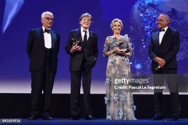 President of the festival Paolo Baratta, Robert Redford, Jane Fonda and director of the festival Alberto Barbera attend the Golden Lion For Lifetime...