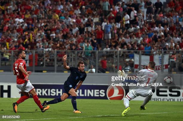 Harry Kane of England scores his team's fourth goal during the FIFA 2018 World Cup Qualifier between Malta and England at Ta'Qali National Stadium on...