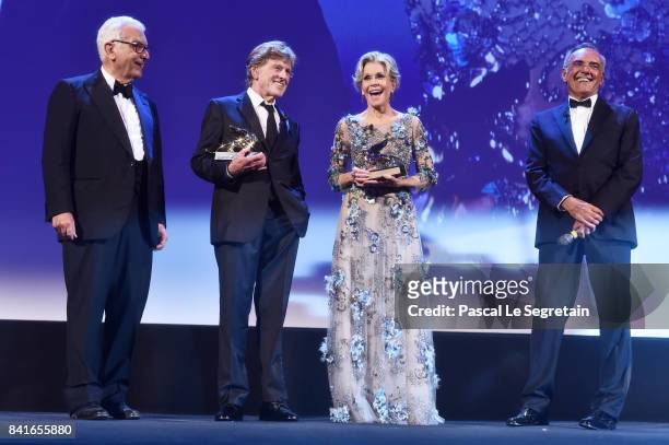 Robert Redford and Jane Fonda receive by President of the festival Paolo Baratta and director of the festival Alberto Barbera a Golden Lion For...
