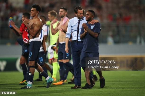 Gareth Southgate manager of England and Raheem Sterling of England in discussion after the FIFA 2018 World Cup Qualifier between Malta and England at...
