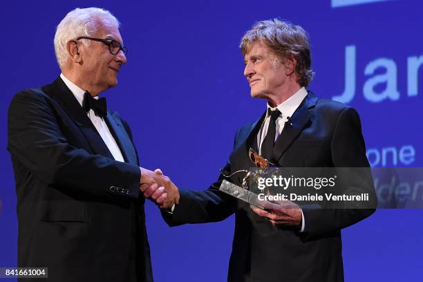 Robert Redford receives by President of the festival Paolo Baratta a Golden Lion For Lifetime Achievement Award during the 74th Venice Film Festival...