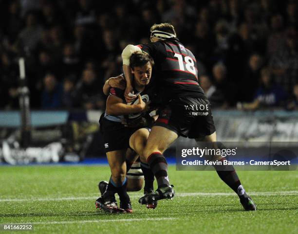 Cardiff Blues' Jarrod Evans is tackled by Edinburgh's Simon Berghan during the Guinness Pro14 Round 1 match between Cardiff Blues and Edinburgh Rugby...