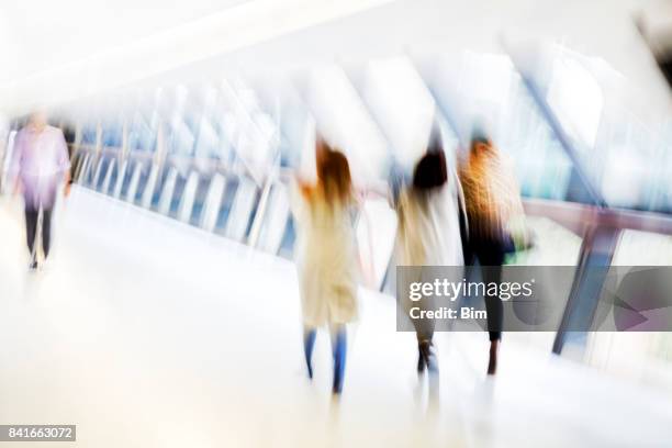 motion blurred people - london docklands stock pictures, royalty-free photos & images