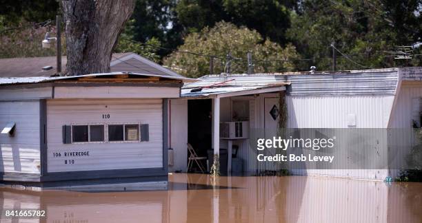 The Edgewood Trailer Park located on the banks of the Brazos River takes on water as the river reaches it's crest on September 1, 2017 in Richmond,...