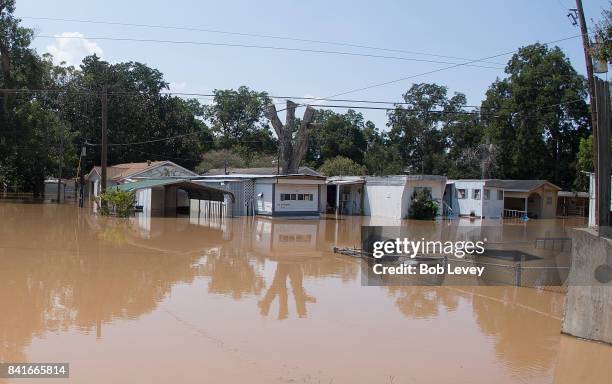 The Edgewood Trailer Park located on the banks of the Brazos River takes on water as the river reaches it's crest on September 1, 2017 in Richmond,...