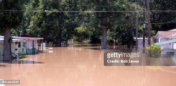 The Edgewood Trailer Park located on the banks of the Brazos River takes on water as the river reaches it's crest on September 1, 2017 in Richmond,...