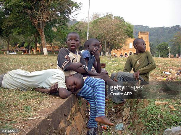 Children from the Voice of the heart foundation in Bangui play in front of the Notre Dame church on December 18, 2008. Like dozens of Central African...