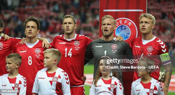 Danish players sing their national anthems prior to the FIFA 2018 World Cup Qualifier between Denmark and Poland at Telia Parken on September 1, 2017...