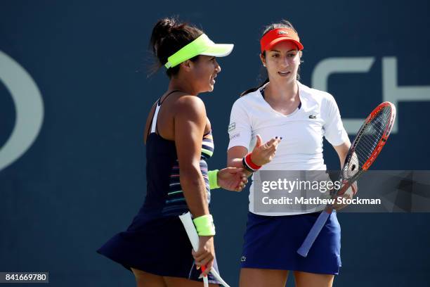 Christina McHale of the United States and Heather Watson of Great Britain in action against Barbora Strycova and Lucie Safarova of the Czech Republic...