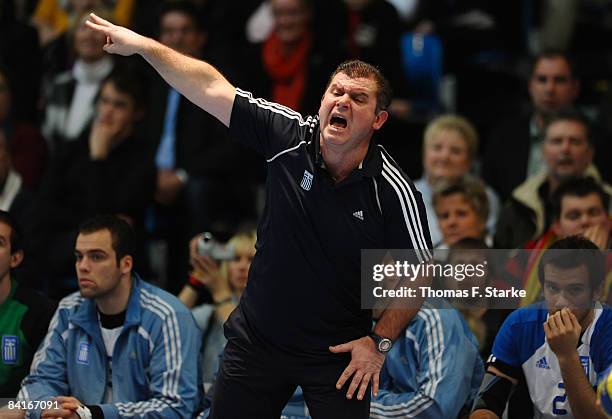 Head coach Nikolaos Mantzos of Greece gives advice to his team during the International Handball Friendly match between Germany and Greece at the...