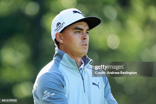 Rickie Fowler of the United States stands on the 13th hole during round one of the Dell Technologies Championship at TPC Boston on September 1, 2017...