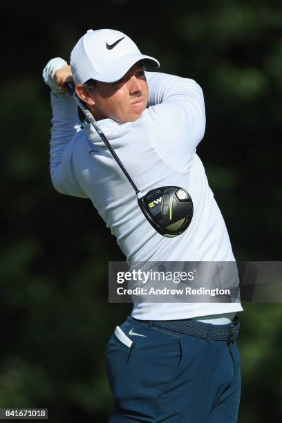 Rory McIlroy of Northern Ireland plays his shot from the 14th tee during round one of the Dell Technologies Championship at TPC Boston on September...