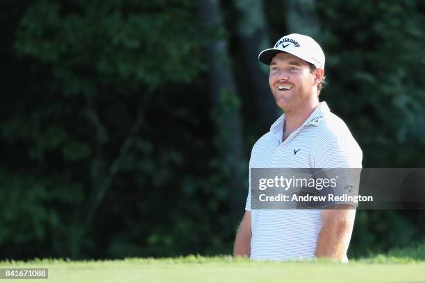 Grayson Murray of the United States reacts on the 18th hole during round one of the Dell Technologies Championship at TPC Boston on September 1, 2017...