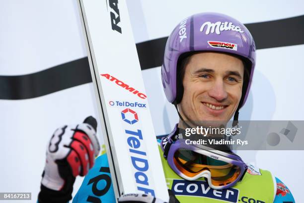 Martin Schmitt of Germany finishing third attends the victory ceremony after the FIS Ski Jumping World Cup at the 57th Four Hills Ski Jumping...