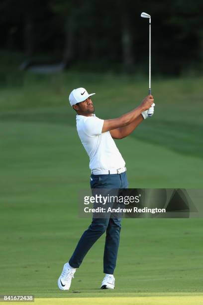 Tony Finau of the United States plays a shot on the ninth hole during round one of the Dell Technologies Championship at TPC Boston on September 1,...