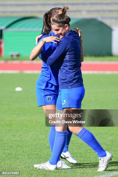 Charlotte Bilbault of Paris FC and Ami Otaki of Paris FC during a training session on September 1, 2017 in Bondoufle, France.