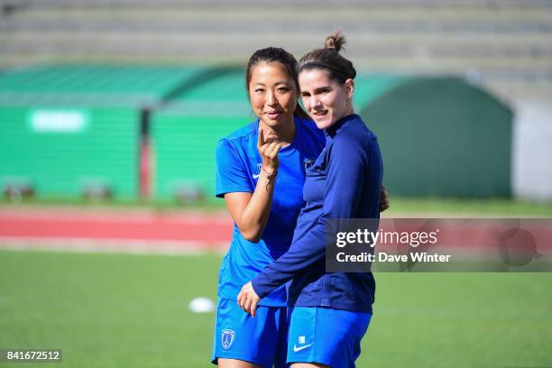 Ami Otaki of Paris FC and Charlotte Bilbault of Paris FC during a training session on September 1, 2017 in Bondoufle, France.