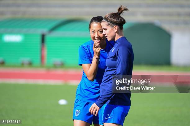 Ami Otaki of Paris FC and Charlotte Bilbault of Paris FC during a training session on September 1, 2017 in Bondoufle, France.