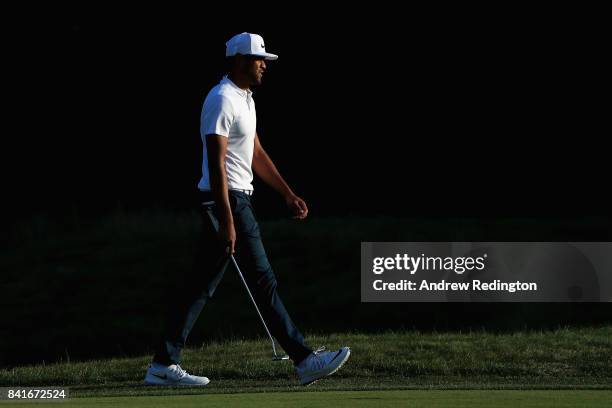 Tony Finau of the United States walks on the ninth hole during round one of the Dell Technologies Championship at TPC Boston on September 1, 2017 in...