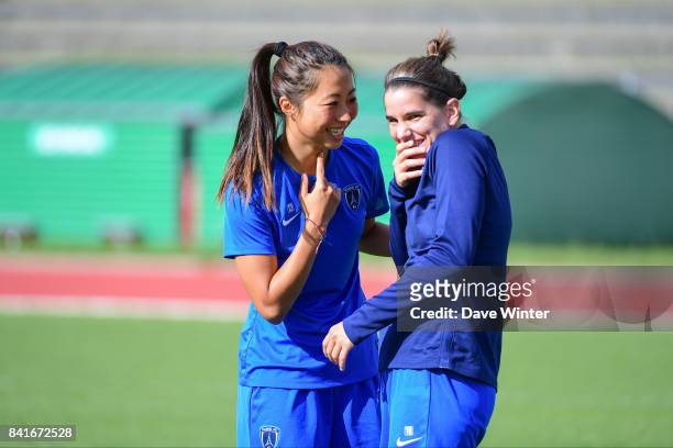 Ami Otaki of Paris FC and Charlotte Bilbault of Paris FC during a training session on September 1, 2017 in Bondoufle, France.