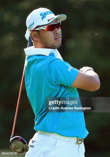 Hideki Matsuyama of Japan plays his shot from the 13th tee during round one of the Dell Technologies Championship at TPC Boston on September 1, 2017...
