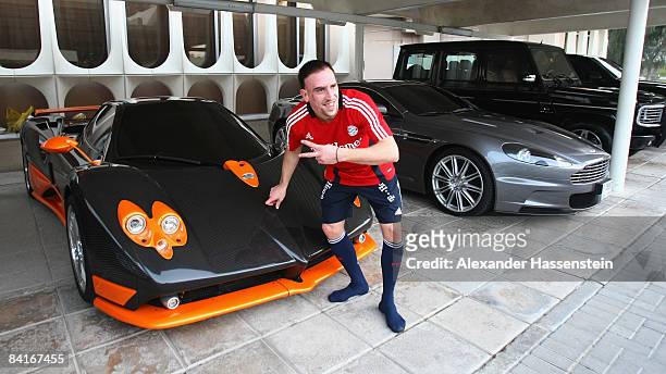 Franck Ribery of Bayern Muenchen visits a car park at the Zaabeel trainings ground with his team matesafter training session on January 4, 2009 in...