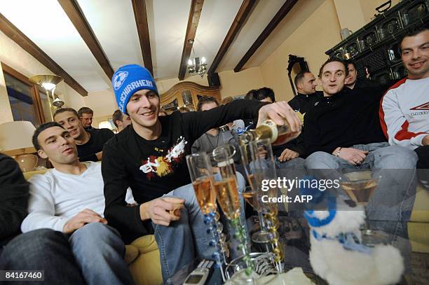 Schirrhein's players Kevin Sortelle, Geoffrey Fornecker, Jerome Lerche, Sylvain kettering, Steve Heit and Maxime Balieux celebrate on January 4, 2009...