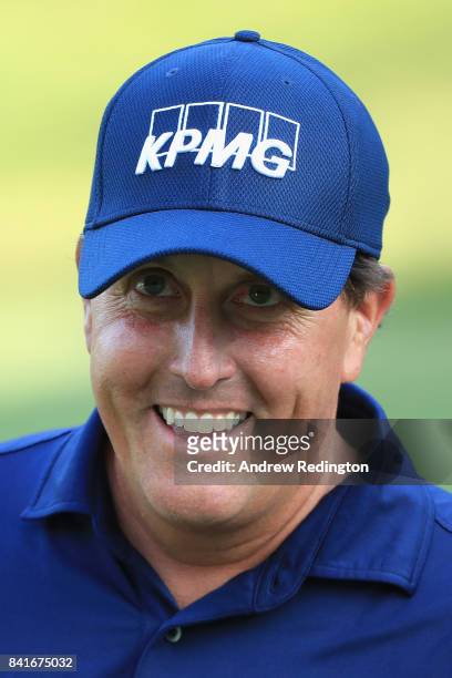 Phil Mickelson of the United States reacts on the ninth green during round one of the Dell Technologies Championship at TPC Boston on September 1,...