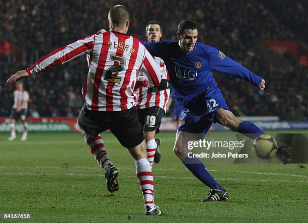 John O'Shea of Manchester United clashes with Chris Perry of Southampton during the FA Cup sponsored by e.on Third Round match between Southampton...