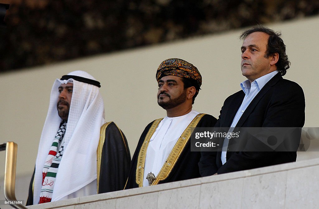 UEFA President Michel Platini (R) attend