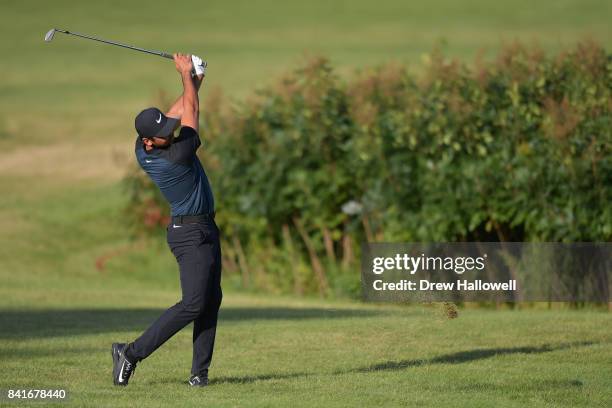 Jason Day of Australia plays a shot on the sixth hole during round one of the Dell Technologies Championship at TPC Boston on September 1, 2017 in...