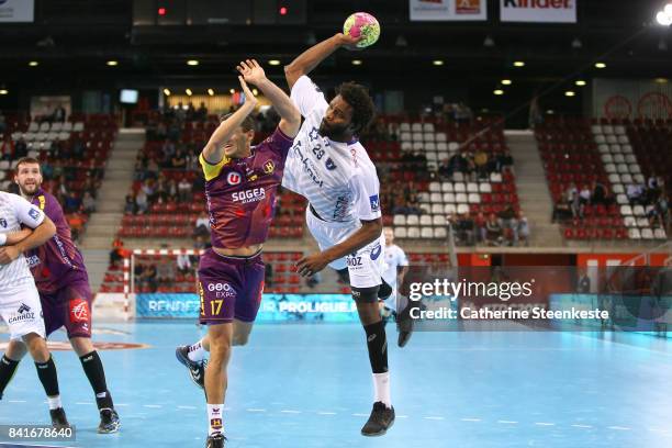 Arnaud Bingo of Montpellier Handball is shooting the ball against Kiril Lazarov of HBC Nantes during the Trophee des Champions Tournament match...