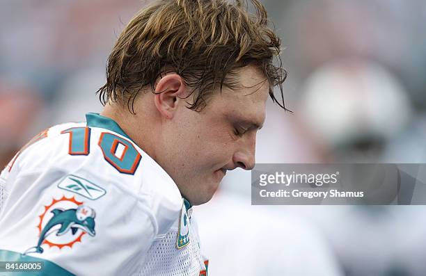 Chad Pennington of the Miami Dolphins looks on from the bench while playing the Baltimore Ravens during the AFC Wild Card playoff game on January 4,...