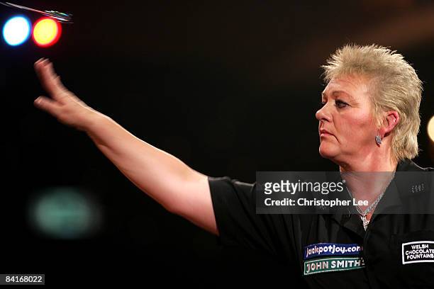 Julie Gore of Wales in action against Rilana Erades of Holland during the Lakeside World Darts Championships 1st Round match at Lakeside on January...
