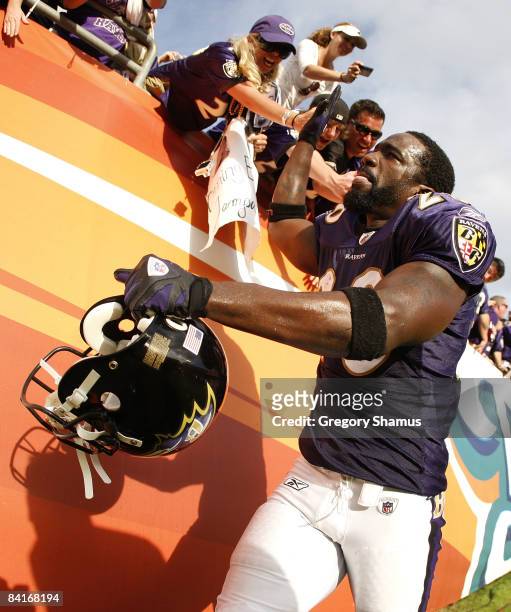 Ed Reed of the Baltimore Ravens celebrates a 27-9 AFC Wild Card victory over the Miami Dolphins with fans on January 4, 2009 at Dolphin Stadium in...