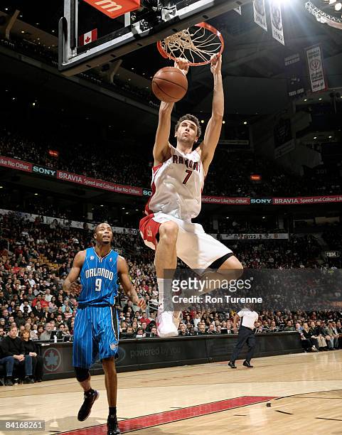 Andrea Bargnani of the Toronto Raptors throws down a dunk during a game against the Orlando Magic on January 4, 2009 at the Air Canada Centre in...