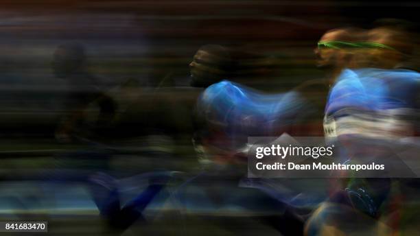 Noah Lyles and Ameer Webb , both of the USA and Ramil Guliyev of Turkmenistan compete in the 200m Mens Final during the AG Memorial Van Damme...