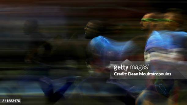 Noah Lyles and Ameer Webb , both of the USA and Ramil Guliyev of Turkmenistan compete in the 200m Mens Final during the AG Memorial Van Damme...