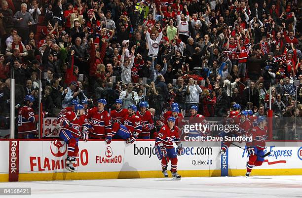 Members of the Montreal Canadiens celebrate their shoot-out win over the Florida Panthers during their NHL game at the Bell Centre January 4, 2009 in...