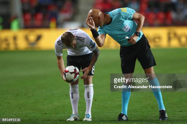 Referee Sergei Karasev reacts to Toni Kroos of Germany during the FIFA World Cup Russia 2018 Group C Qualifier between Czech Republic and Germany at...