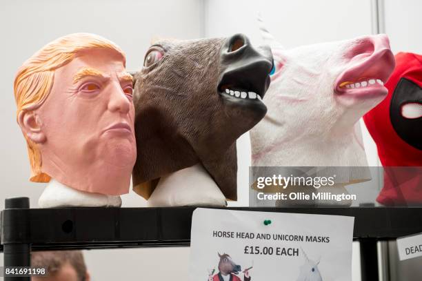 Donald Trump and horse masks for sale during day 1 of the London Super Comic Con at Business Design Centre on August 25, 2017 in London, England.