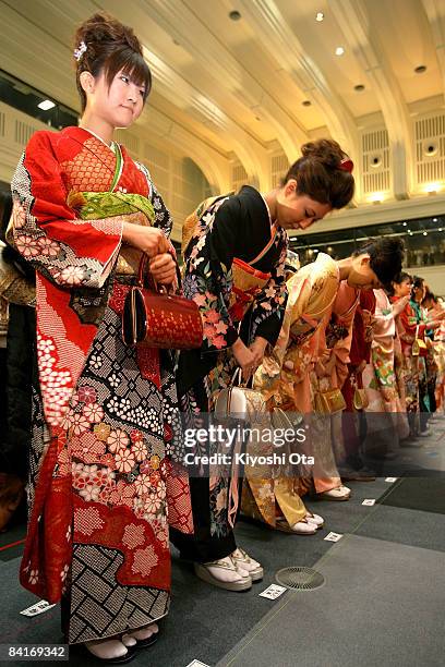 Women dressed in kimonos attend the opening ceremony to celebrate the start of the year's trading at the Tokyo Stock Exchange on January 5, 2009 in...