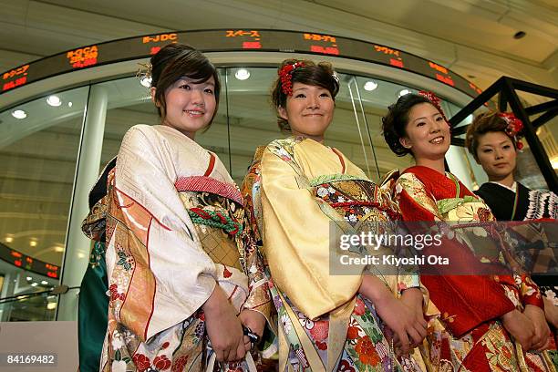 Women dressed in kimonos attend the opening ceremony to celebrate the start of the year's trading at the Tokyo Stock Exchange on January 5, 2009 in...