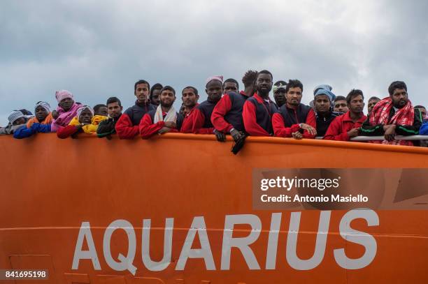 African migrants landing in the port of Salerno aboard the "Aquarius" ship of the Ngo "SOS Mediterranee" on May 26, 2017 in Salerno, Italy. On board...